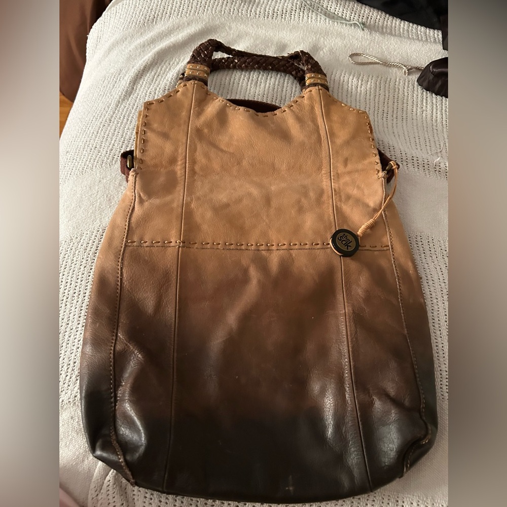 THE SAK brown and tan leather w/shoulder straps and shorter straps.. Not New..